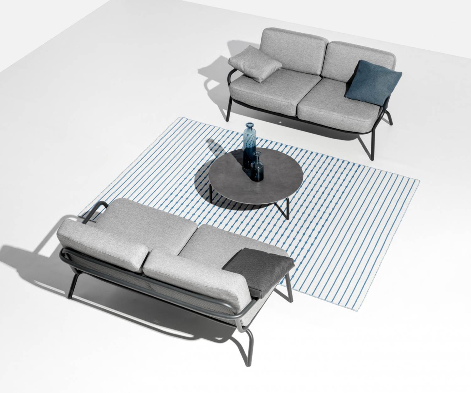 Two Todus Starling Design lounge sofas facing each other with coffee table