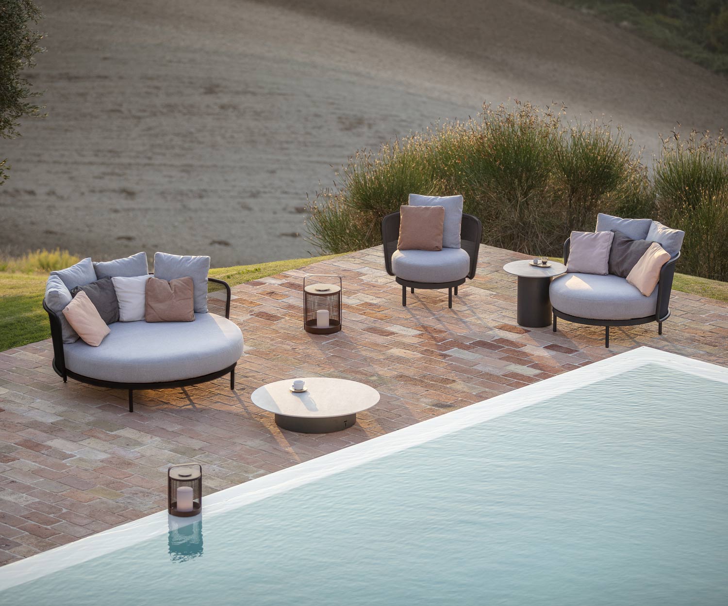 Garden Lounge Club Design Chair Baza from Todus by the pool on the terrace