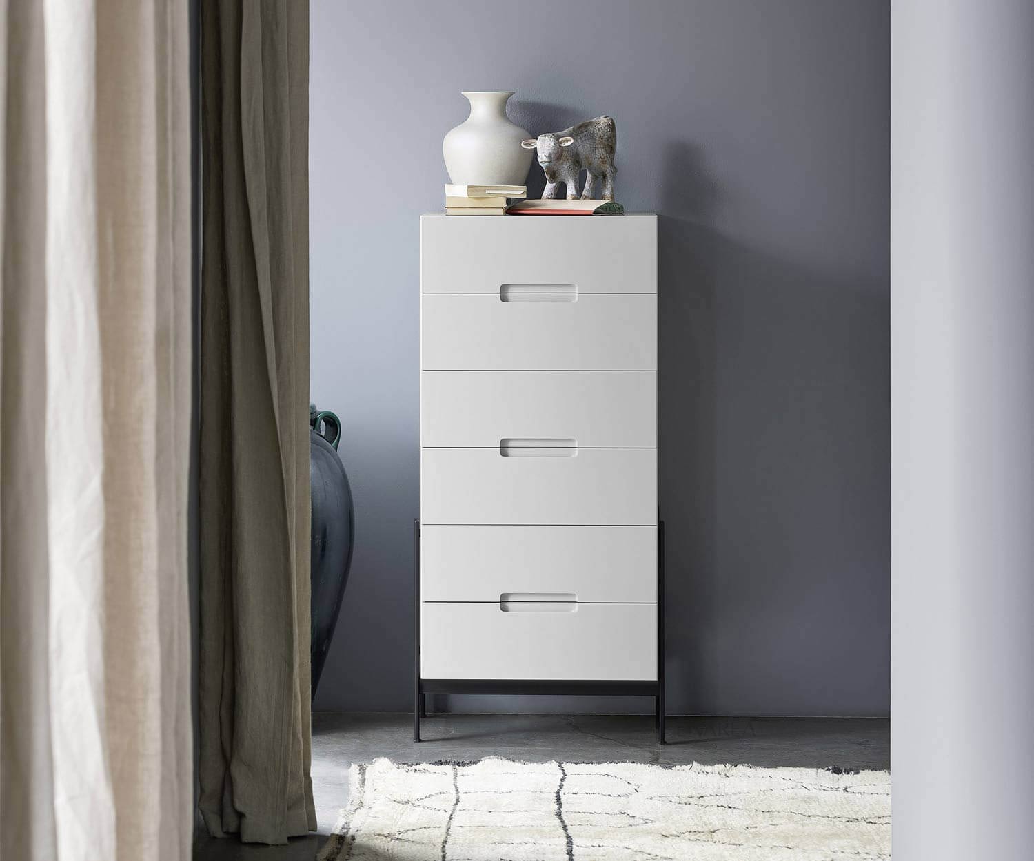 Float designer high chest of drawers from Novamobili in white on black feet
