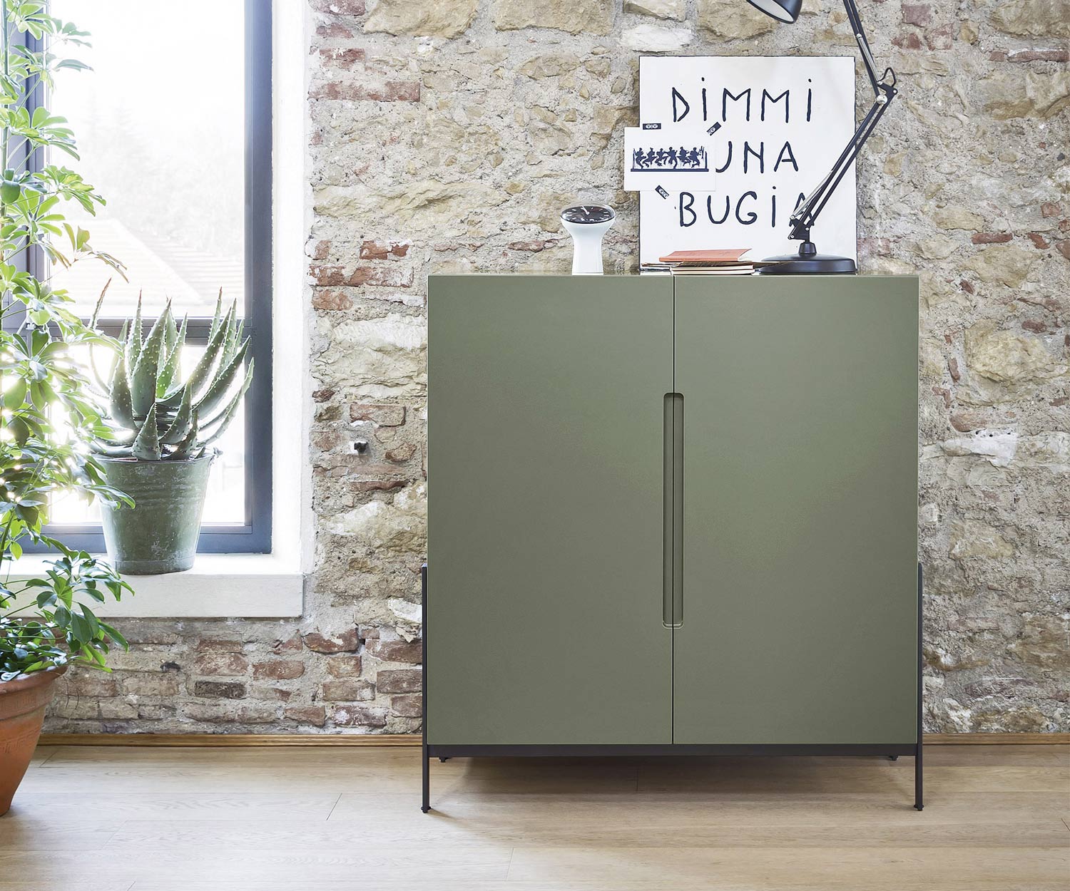 Design highboard Float from Novamobili in green matt lacquered in the living room