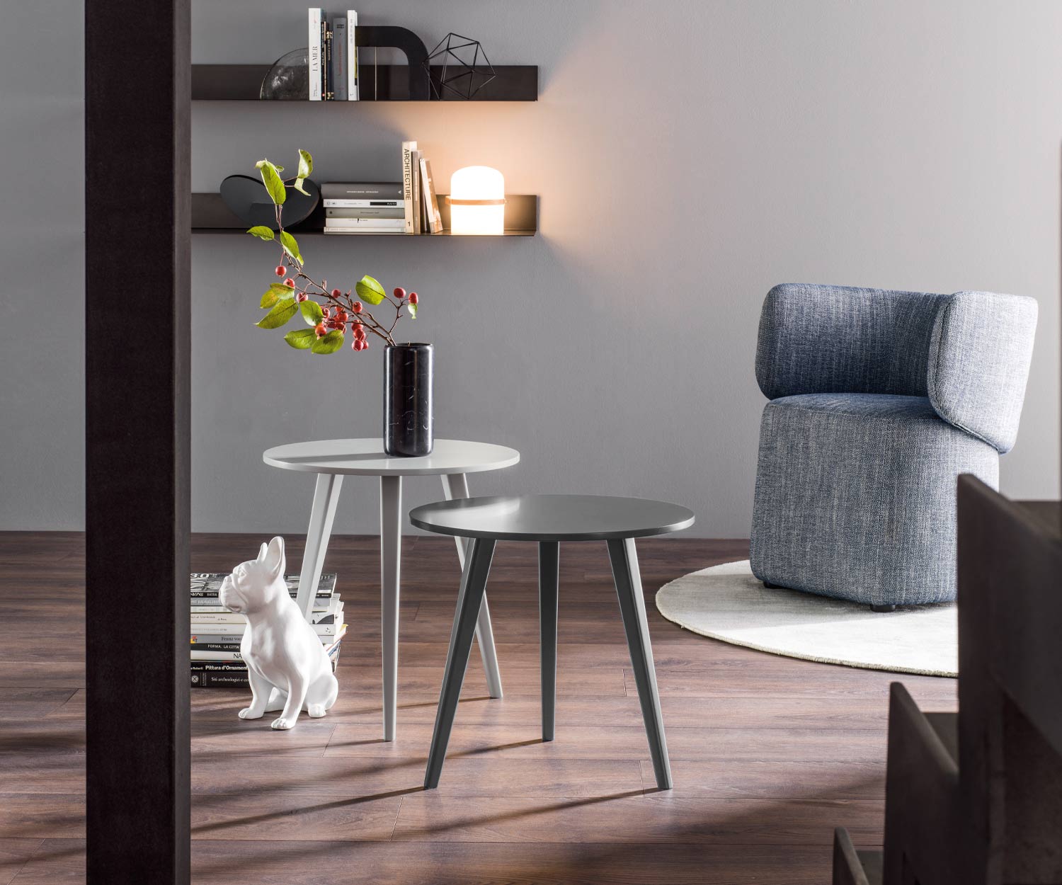 Light grey black Novamobili Design Trio table in the living room with three legs