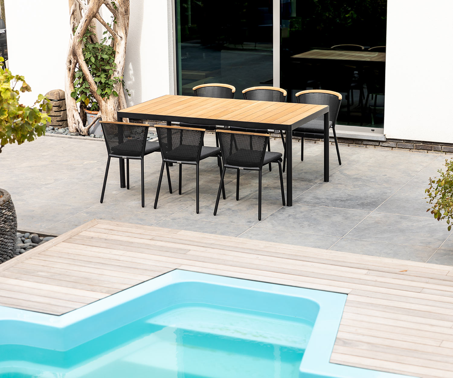 Weatherproof Oasiq Riad design garden table on poolside terrace