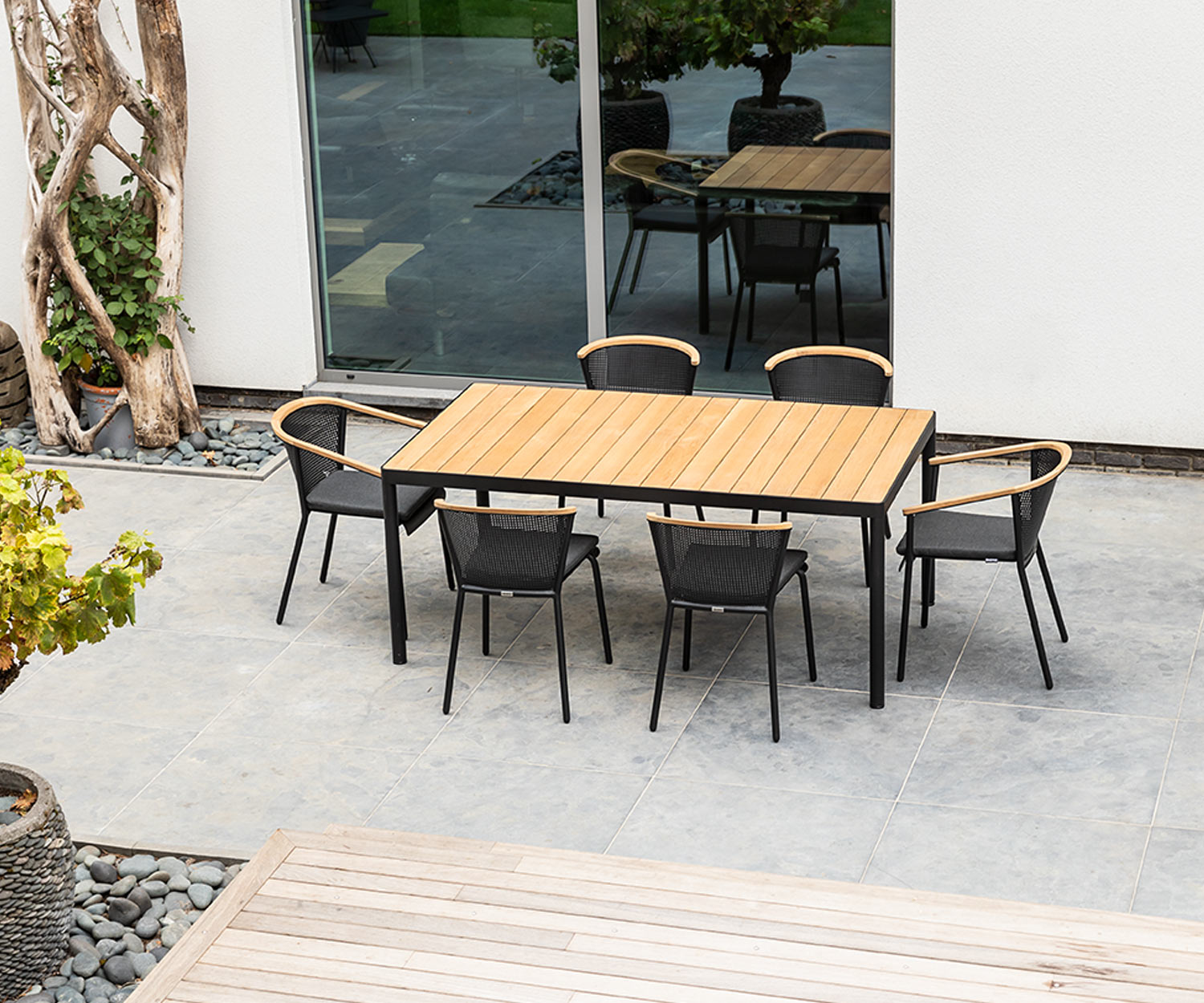 Weatherproof Oasiq Riad design garden chair with aluminium frame on terrace