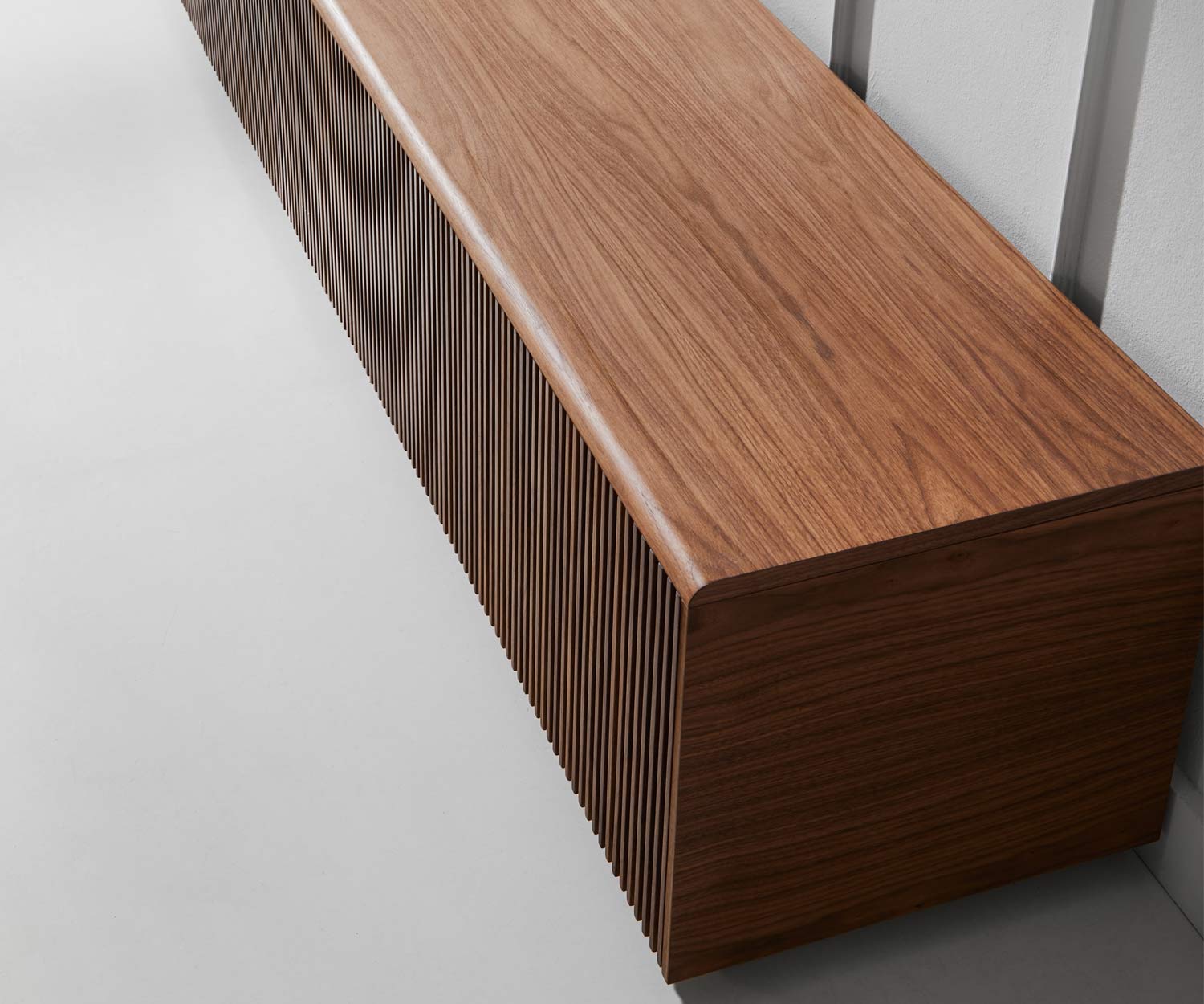 Design TV design lowboard Detail edges of real wood veneer carcass finished with walnut